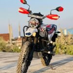 "Hero X Pulse 200 motorcycle par installed black crash guard for safety"